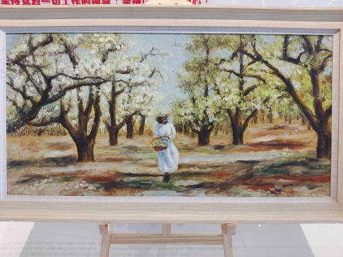 油彩为媒，梨花为魂 呈贡女画家共绘“最美女人花”